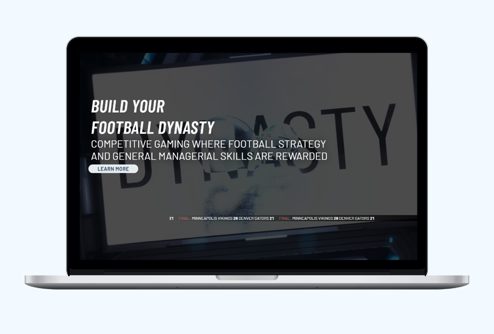 Página de inicio de GM Dynasty en un portátil con el titular Build Your Football Dynasty y un botón Learn More